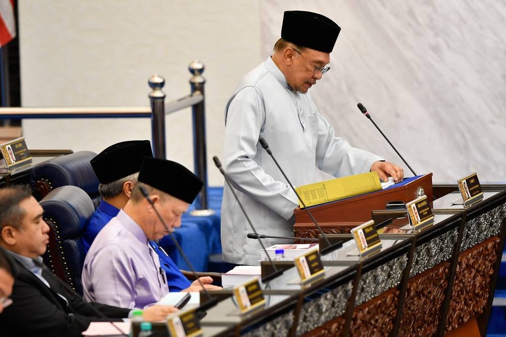 Finance Minister and Prime Minister Datuk Seri Anwar Ibrahim presenting the 2026 Budget in the Dewan Rakyat, today. - Photo by Bernama