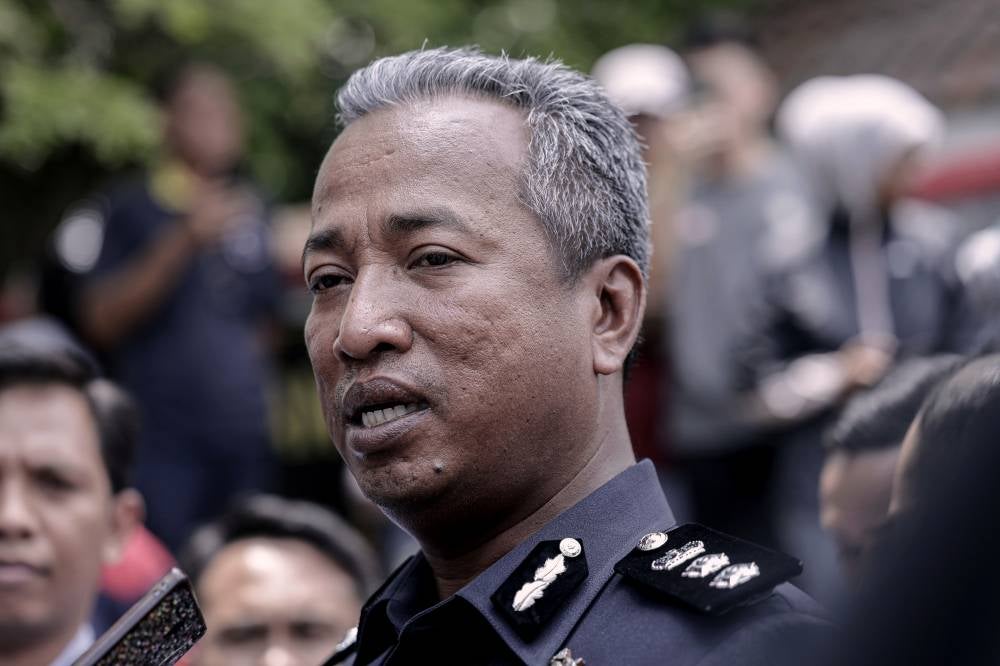 Petaling Jaya police chief ACP Shamsudin Mamat during a press conference on a stabbing incident that claimed the life of a 16-year-old female student at a secondary school, this morning. - Photo by Bernama
