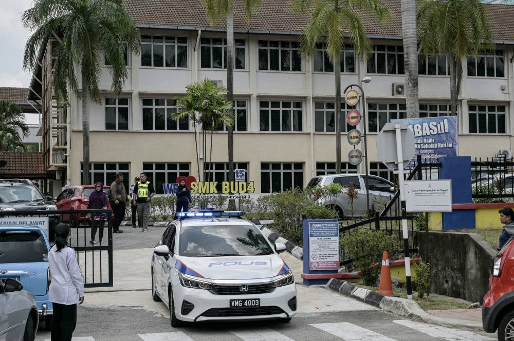 The remains of a female student who was fatally stabbed at a secondary school in Petaling Jaya yesterday have been claimed by her family this morning. - Photo by Bernama