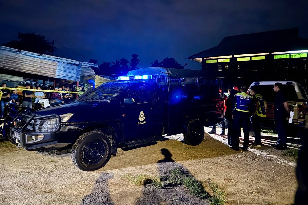 The shocking murder of a mother and her 11-year-old daughter in Kampung Juru has gripped the nation, as police continue to investigate the brutal double killing that has left the community in disbelief. Photo by Bernama