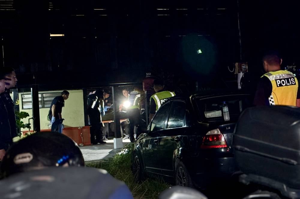 The shocking murder of a mother and her 11-year-old daughter in Kampung Juru has gripped the nation, as police continue to investigate the brutal double killing that has left the community in disbelief. Photo by Bernama