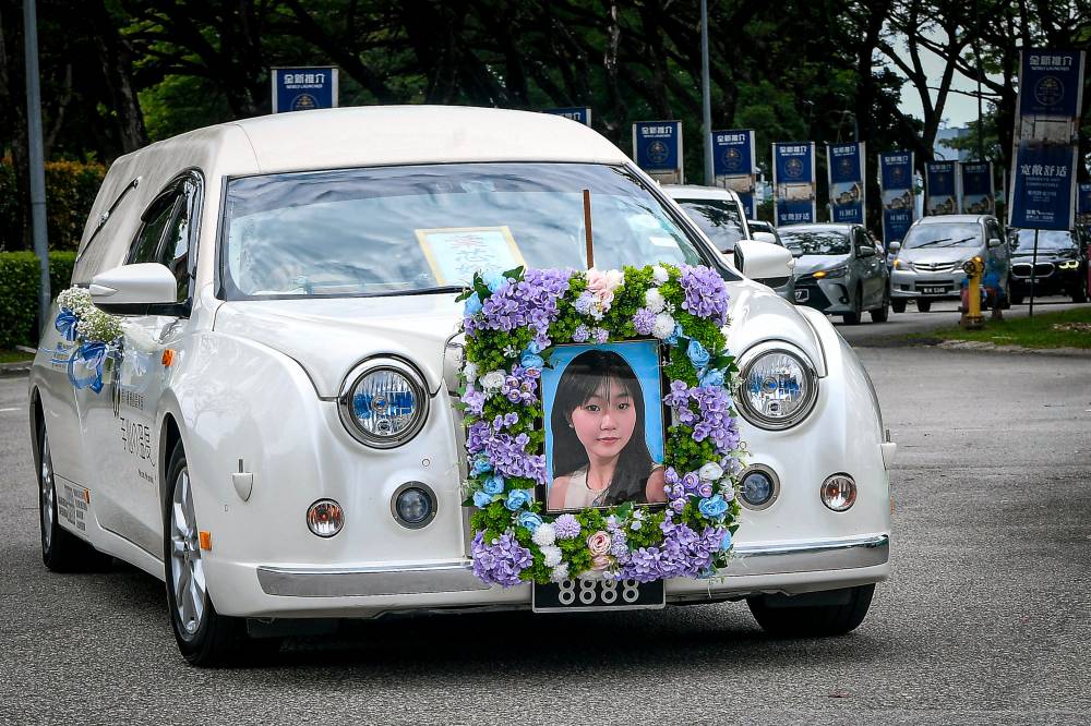 The body of the female student who was fatally stabbed at a school in Petaling Jaya last week was transported from Nirvana Centre KL to Nirvana Memorial Park in Section 21, Shah Alam on Oct 20, 2025. - Photo by Bernama