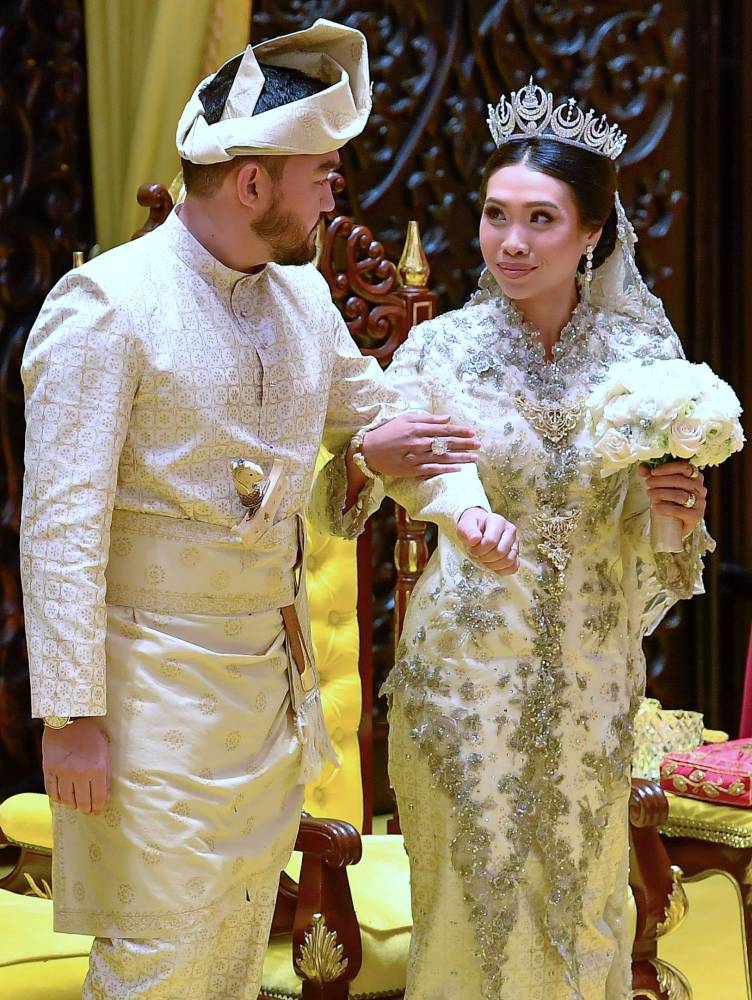 The royal couple were officially married in a closed-door royal solemnisation ceremony at the Masjid Istana Diraja, Istana Alam Shah on Oct 2, with the marriage vows pronounced at 10.08am in a single recitation, followed by an 11-gun salute by the 41st Battery of the Royal Artillery Regiment (Ceremonial). Photo by Bernama