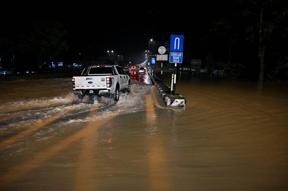 Perak has been hit by floods following heavy rain since yesterday morning, affecting the districts of Larut, Matang and Selama as well as Manjung, with three temporary evacuation centres opened as of 9pm, last night. - Photo by Bernama