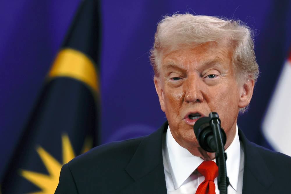 United States President Donald Trump delivers his speech at the signing ceremony of the peace agreement, 