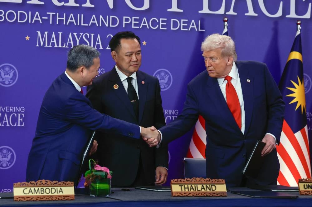 KUALA LUMPUR, Oct 26 - United States President Donald Trump shakes hands with Cambodian Prime Minister Hun Manet, as Thai Prime Minister Anutin Charnvirakul looks on, at the signing of the Cambodia-Thailand peace deal held in conjunction with the 47th ASEAN Summit and Related Summits today. (BERNAMA PHOTO) 