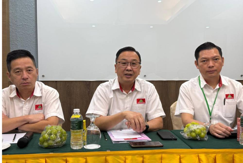 Datuk Dr Dominic Lau (centre) speaking at a press conference after officiating the 50th Negeri Sembilan Gerakan Delegates Conference at a hotel on Sunday.