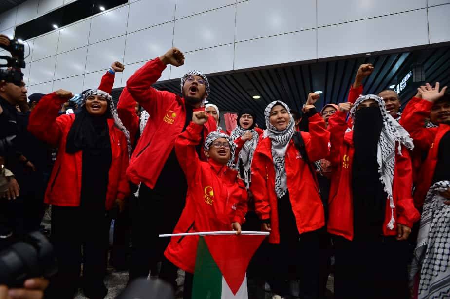 Malaysian GSF volunteers arrived at KLIA on Oct 7, 2025. - Photo by ASRIL ASWANDI SHUKOR