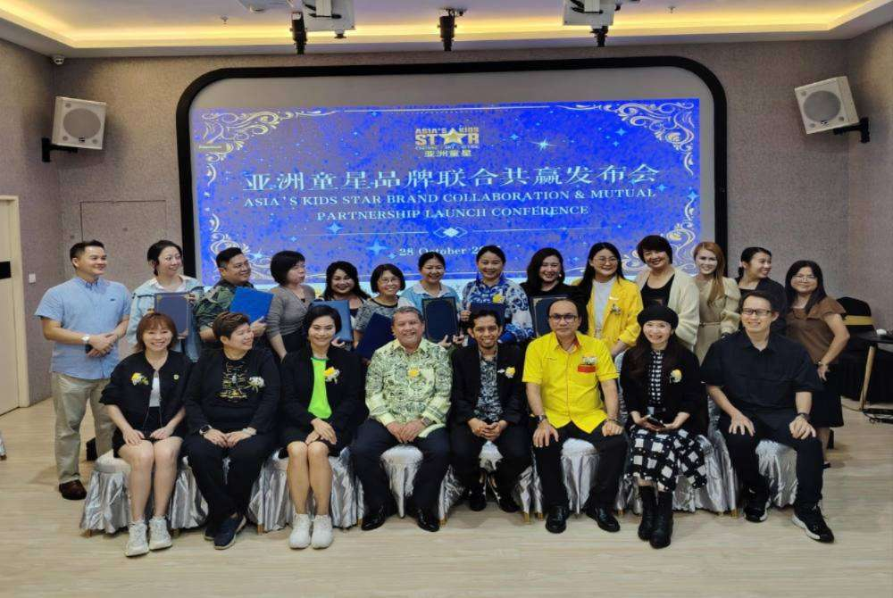 Dr Mazlan Goh (seated, third from right) during the launch of Asia's Kids Star Special TV Program on Tuesday.