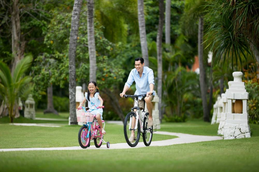 Family cycling tour at The Westin Resort, Nusa Dua, Bali.