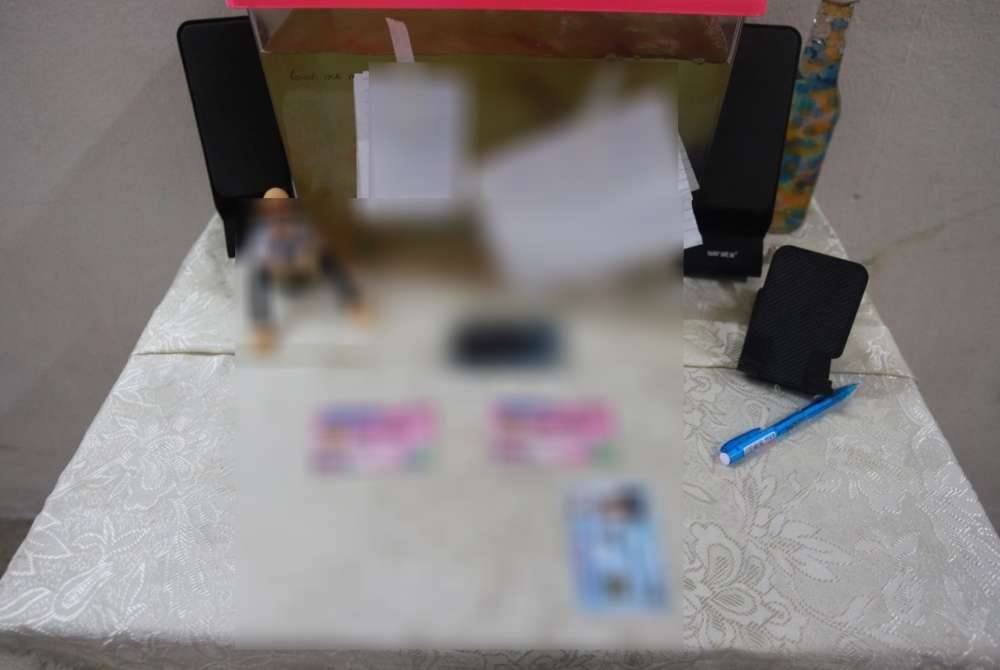 Police found two handwritten notes believed to have been written by the deceased, expressing her apologies and emotions inside the house. – Photo courtesy of PDRM