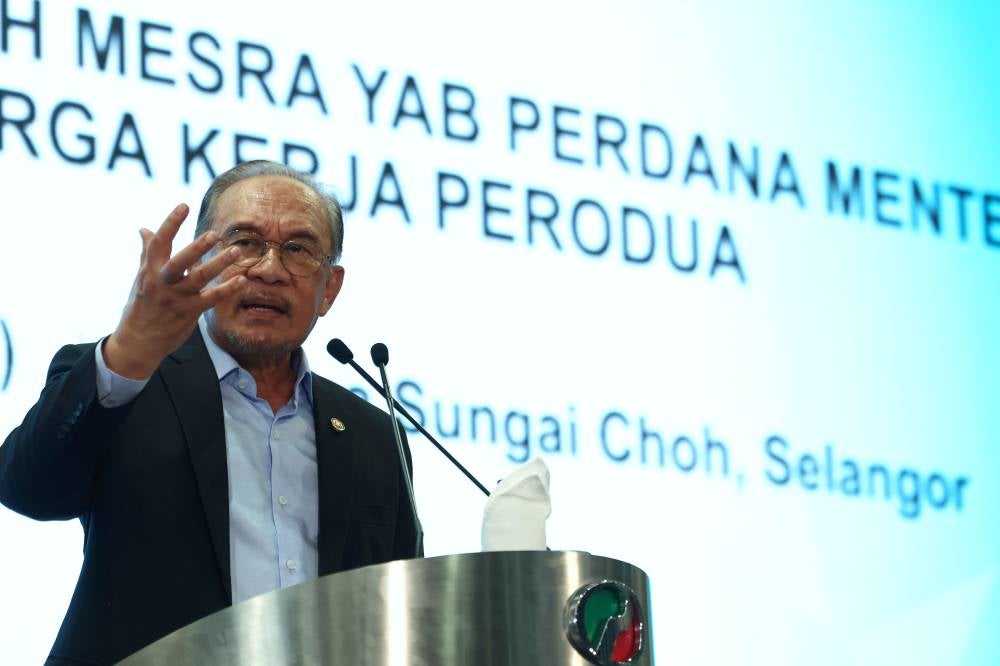 Prime Minister Datuk Seri Anwar Ibrahim delivered a speech during his visit and meet-and-greet session with Perodua employees here today. Photo by Bernama
