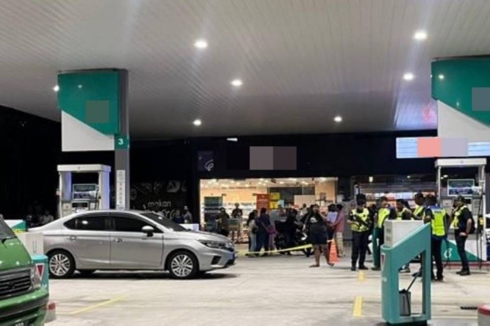 Two violent petrol station incidents in Klang within a week have raised public concern, one involving an injured police officer during an arrest attempt and the other a fatal shooting. Photo: Screenshot from social media
