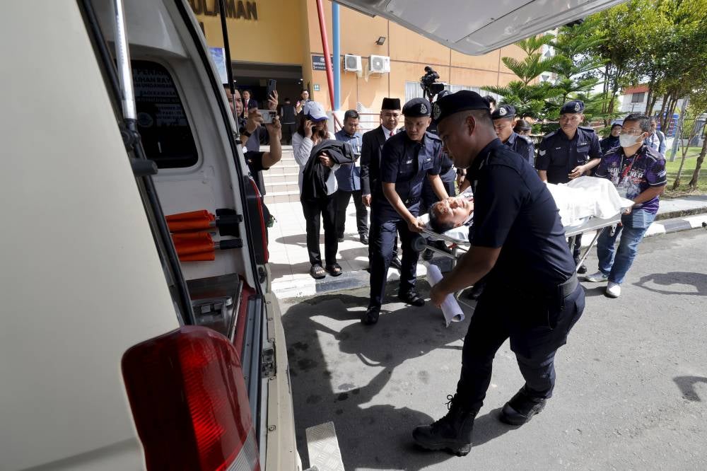 PKS candidate for the Kiulu State Legislative Assembly Dusi Gingging had to be rushed to Tuaran Hospital for further treatment during the nomination process for the 17th Sabah state election at Dewan Seri Sulaman today. - Photo by Bernama