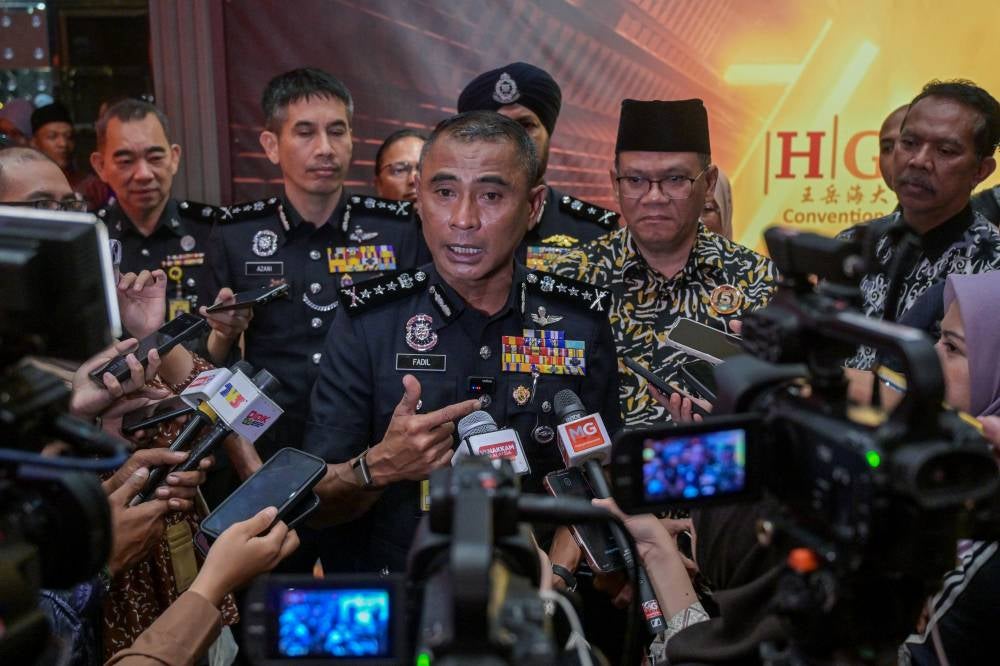 Kuala Lumpur police chief Datuk Fadil Marsus (centre). Bernama FILE PIX