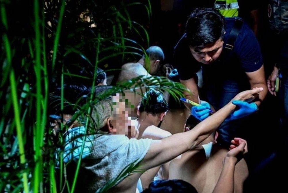A total of 202 men, including 17 civil servants, were detained after they were suspected of being involved in homosexual activities at a spa in Chow Kit recently. Photo: Bernama