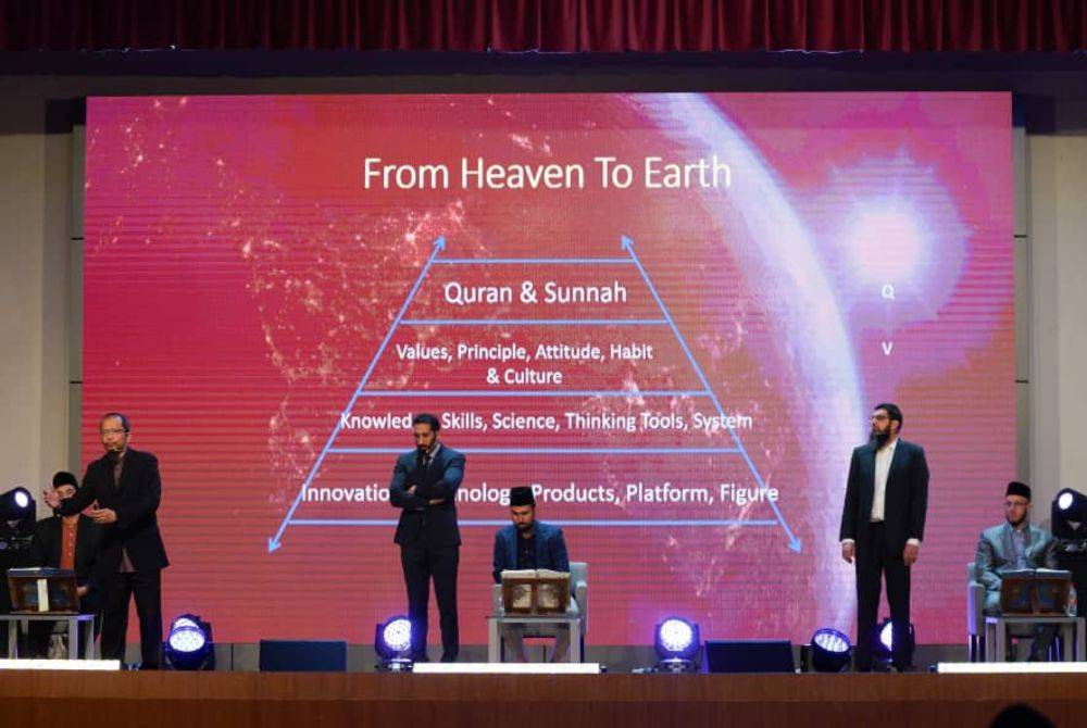 (Standing from left): WUIF chief content officer Fazrul Ismail, Bayyinah Institute founder Nouman Ali Khan and Oxford Intellect chief executive Dr Imran Alvi at the World #Quran Convention at the Perdana Hall, Miti, Kuala Lumpur. - Photo by ROSLI TALIB