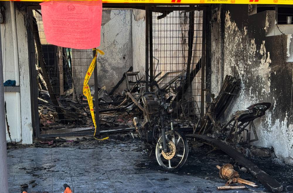 The bodies of the victims were found in the living room near the main entrance, while Daniel Quyum was found near the kitchen door and was taken to Seberang Jaya Hospital (HSJ) for treatment. Photo by Bernama