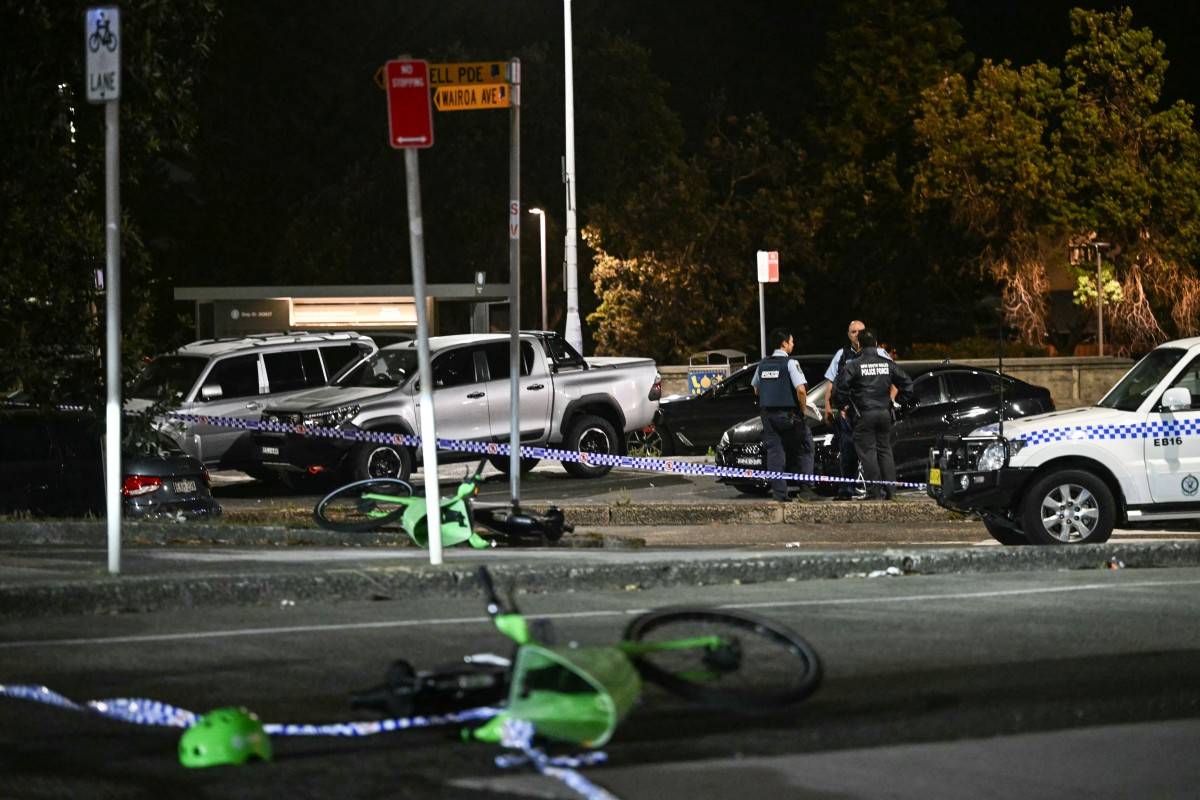Police work at the scene after a shooting incident at Bondi Beach in Sydney. Photo by Saeed Khan/AFP