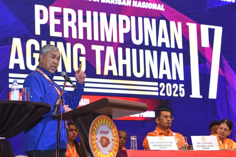 Deputy Prime Minister and Barisan Nasional chairman Datuk Seri Dr Ahmad Zahid Hamidi during his speech at Parti Makkal Sakti's 17th Annual General Assembly in Butterworth, Penang on Dec 21, 2025. (BERNAMA PHOTO)