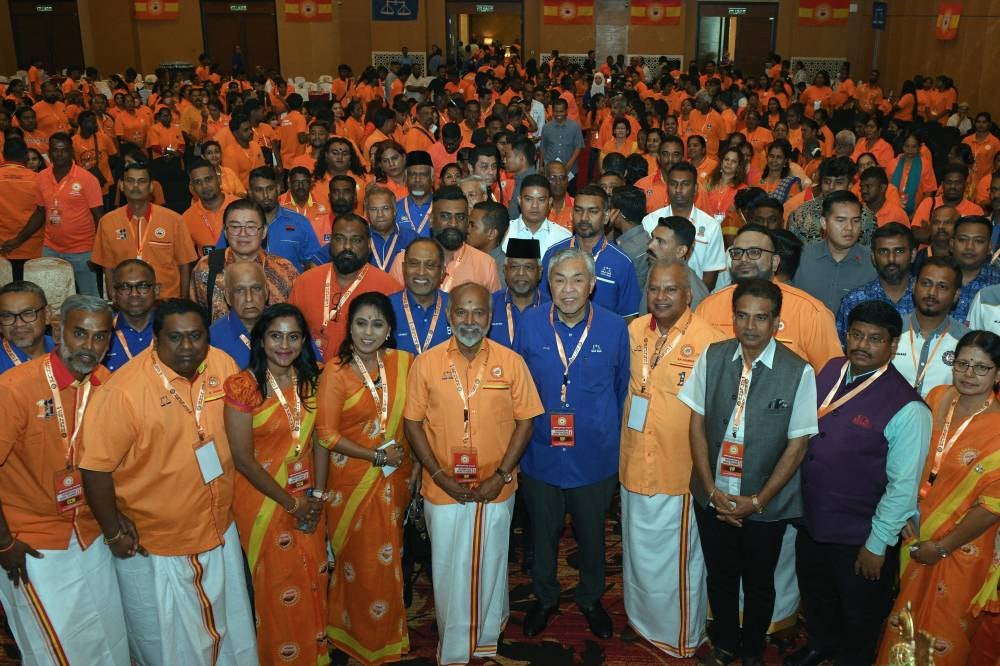Deputy Prime Minister and Barisan Nasional chairman Datuk Seri Dr Ahmad Zahid Hamidi posing for photos with Parti Makkal Sakti leaders during the party's 17th Annual General Assembly in Butterworth, Penang on Dec 21, 2025. (BERNAMA PHOTO)