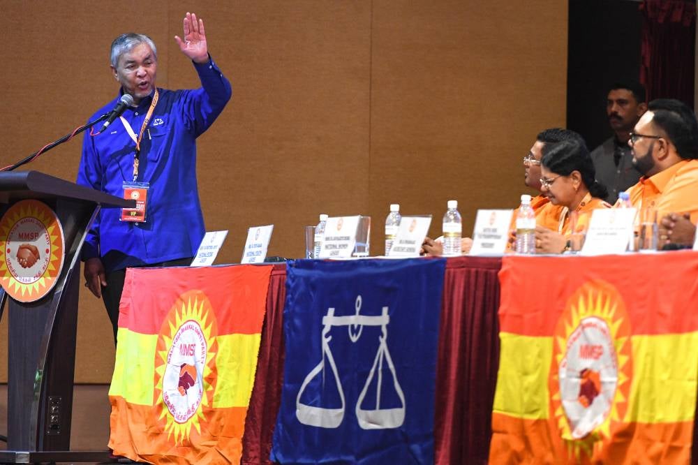 Deputy Prime Minister and Barisan Nasional chairman Datuk Seri Dr Ahmad Zahid Hamidi during his speech at Parti Makkal Sakti's 17th Annual General Assembly in Butterworth, Penang on Dec 21, 2025. (BERNAMA PHOTO)