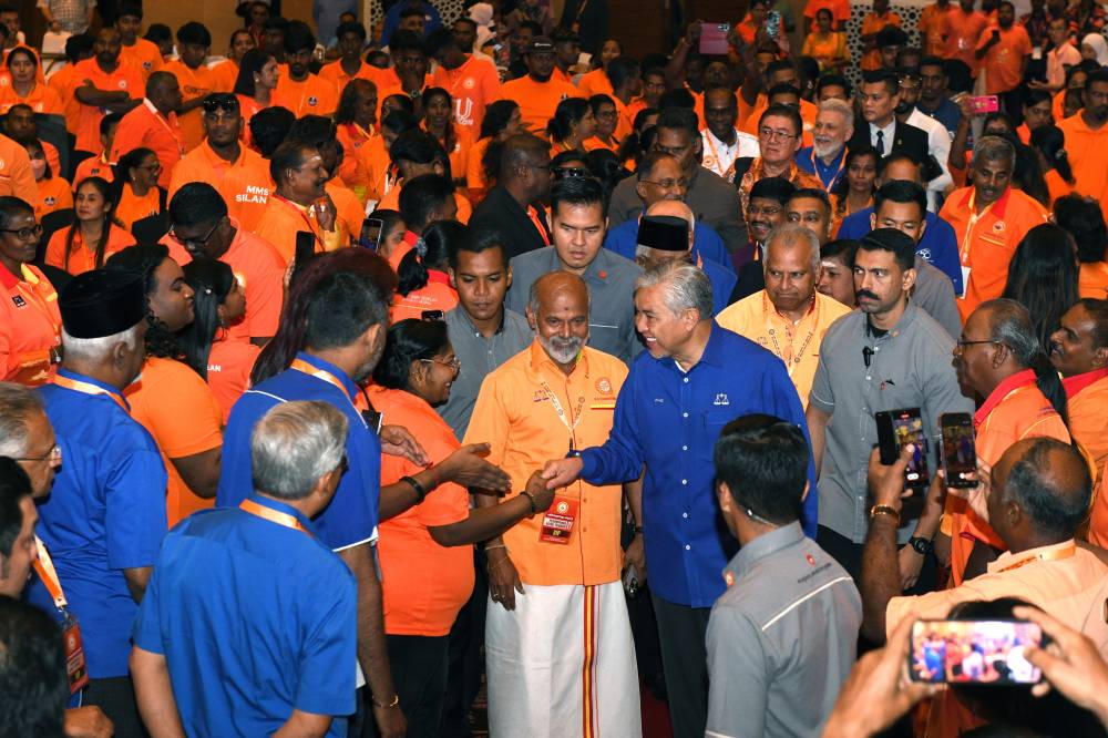 Deputy Prime Minister and Barisan Nasional chairman Datuk Seri Dr Ahmad Zahid Hamidi welcomed by Parti Makkal Sakti leaders during the party’s 17th Annual General Assembly in Butterworth, Penang on Dec 21, 2025. (BERNAMA PHOTO)