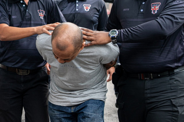 A 51-year-old man was charged in the Magistrate’s Court here today with the murder of Suri Narudin, whose body was discovered in a bag buried behind a house near Rembau. Photo by Bernama