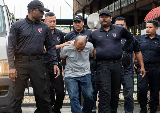 A 51-year-old man was charged in the Magistrate’s Court here today with the murder of Suri Narudin, whose body was discovered in a bag buried behind a house near Rembau. Photo by Bernama
