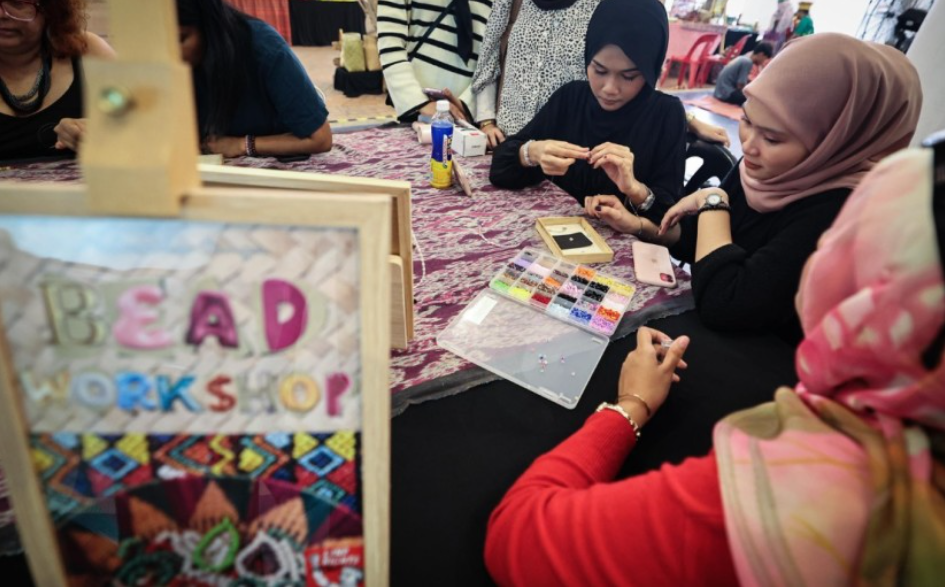 Participants get to choose their own beads and pendants, then design either a necklace, bracelet or anklet within an hour.