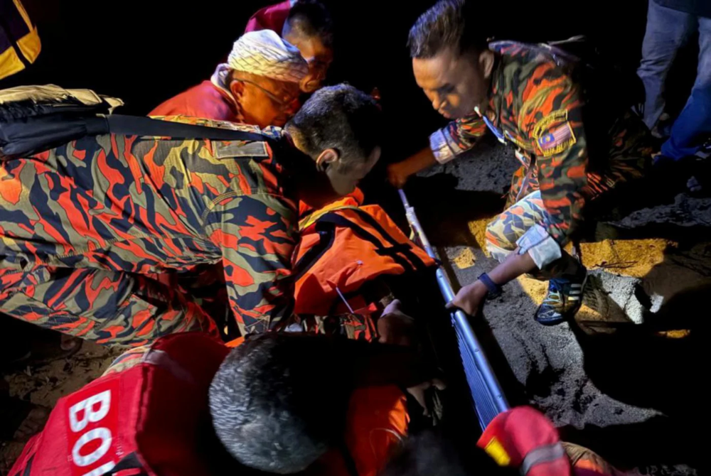 Mohd Fazir’s body was found at around 12.35 am, about 1km from where he was reported missing. Photo courtesy: Fire and Rescue Department