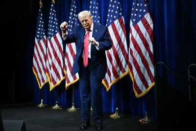 US President Donald Trump does a little dance after he delivered remarks at the House Republican Party member retreat at the Kennedy Center in Washington, DC, on Jan 6, 2026. - (Photo by Mandel Ngan / AFP)
