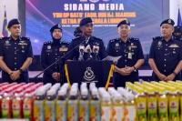 Kuala Lumpur police chief Datuk Fadil Marsus (centre) during a press conference at the Kuala Lumpur Police Contingent Headquarters, today. - Bernama photo