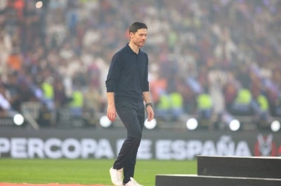 Real Madrid's Spanish coach Xabi Alonso reacts after the Spanish Super Cup final football match between FC Barcelona and Real Madrid at the King Abdullah Stadium in Jeddah on January 11, 2026. Real Madrid appointed Alvaro Arbeloa as new coach on January 12, 2026 after coach Xabi Alonso has left the club by mutual consent, a day after the team lost the Spanish Super Cup final against rivals Barcelona, AFP reports. (Photo by Haitham AL-SHUKAIRI / AFP)