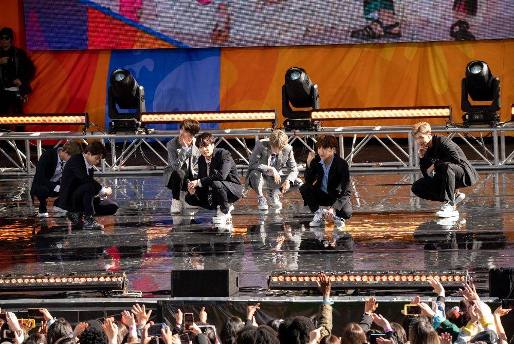 Kim Tae-hyung, Park Ji-min, Jungkook, Suga, Kim Seok-jin, RM and J-Hope of BTS perform on "Good Morning America" on May 15, 2019 in New York City. - (Photo by Noam Galai / Getty Images via AFP)