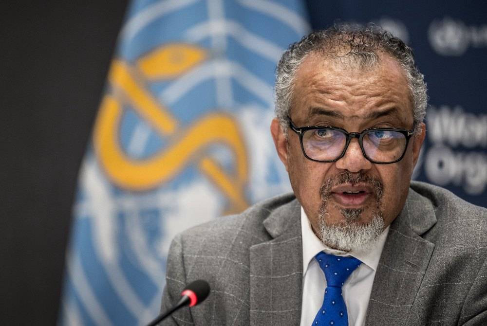 WHO Director-General Tedros Adhanom Ghebreyesus looks on during a press conference with the Association of Accredited Correspondents at the United Nations at the WHO's headquarters in Geneva, on Dec 10, 2024. - (Photo by FABRICE COFFRINI / AFP)
