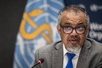 WHO Director-General Tedros Adhanom Ghebreyesus looks on during a press conference with the Association of Accredited Correspondents at the United Nations at the WHO's headquarters in Geneva, on Dec 10, 2024. - (Photo by FABRICE COFFRINI / AFP)