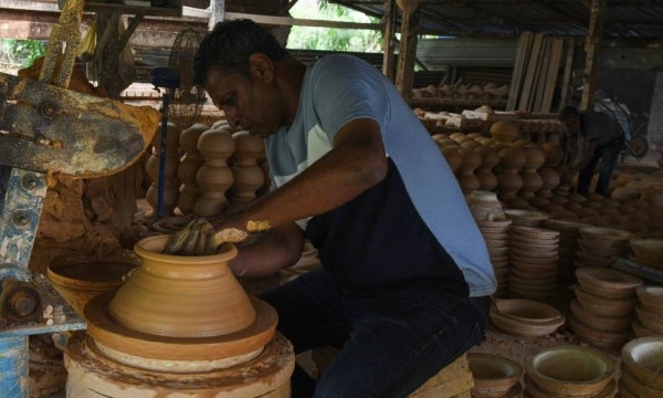 Reguraj said the clay pot-making business he operates has been in his family for more than 120 years, beginning with his ancestors, making him one of the few remaining traditional craftsmen still steadfast in preserving the legacy. - Bernama photo