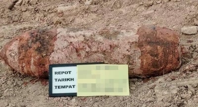 An old bomb weighing 227kg was discovered at a project site in Kampung Air Panas, Bemban, yesterday. - Bernama photo