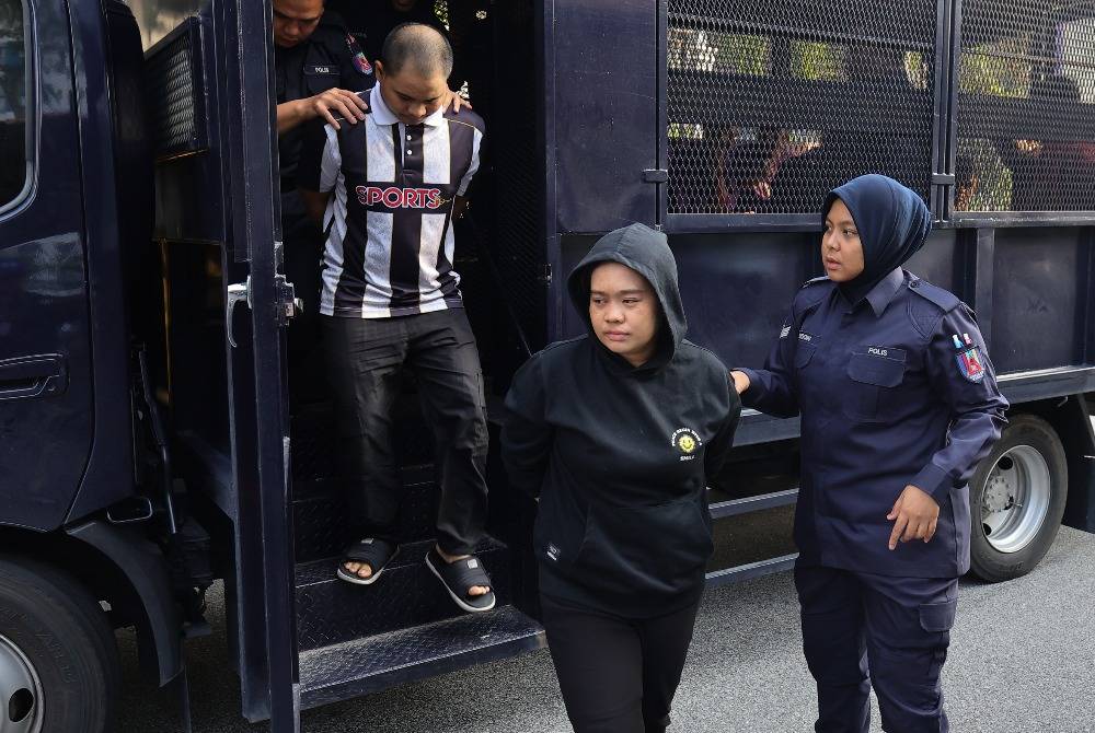 A woman pleaded not guilty at the Sessions Court here today to a charge of neglecting her biological child, while her boyfriend was charged with causing injury to the victim. Photo by Bernama