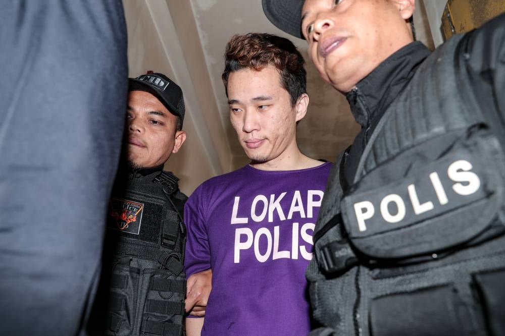 Chia Tong Hong was charged with murdering his wife, Phun Lai Ling, 37 and their five-year-old son, Aaden Chia Yee Heng. Photo by Bernama