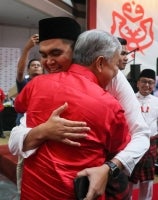 Umno Youth chief Datuk Dr Muhamad Akmal Saleh and Umno President Datuk Seri Zahid Hamidi. Bernama FILE PIX