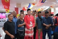 Nizar with supporters during the 2025 Umno General Assembly. (Nizar Razak Facebook) 