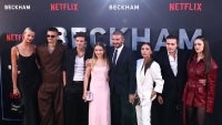 Former England footballer David Beckham (5L) and his wife Victoria Beckham (3R) pose on the red carpet with their children and partners, (from L) Mia Regan, Romeo Beckham, Cruz Beckham, Harper Beckham, Brooklyn Beckham Nicola Peltz Beckham upon arrival to attend the Premiere of "Beckham" in London on Oct 3, 2023. - (Photo by HENRY NICHOLLS / AFP)