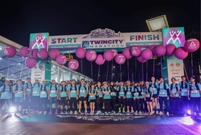 Medic runners stand ready as frontline medical responders during the Twincity Marathon 2026, prepared to provide immediate assistance to participants along the race route. 