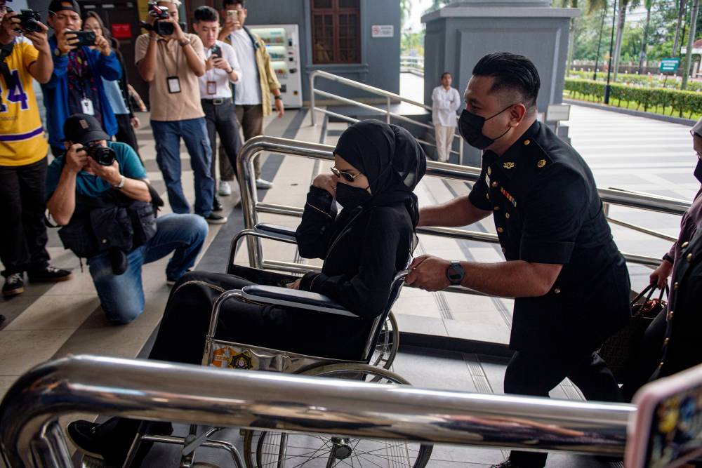 Salwani, 27, pleaded not guilty after all four charges were read out to her before Judge Rosli Ahmad. - Bernama photo