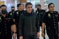 The prosecution is committed to proving its case against former Army Chief General Tan Sri Muhammad Hafizuddeain Jantan and his wife, Salwani Anuar @ Kamaruddin, who stand accused of money laundering involving millions of ringgit. - Bernama photo