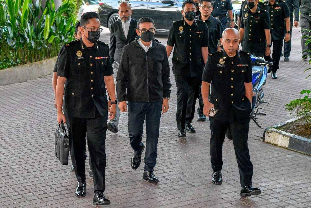 Former Army Chief Tan Sri Muhammad Hafizuddeain Jantan was charged at the Sessions Court here today on two counts of receiving RM145,000 in proceeds allegedly linked to illegal activities. Photo by Bernama