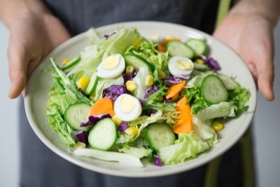 Healthy nutrition is a vital first step in improving female fertility, as the hormonal system requires sufficient nutrients to function optimally. - Photo illustrated via Canva