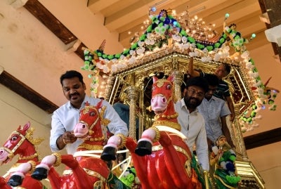 Penang Nattukotai Chettiar Temple Trust Manager, PRC Veerappan (left) with volunteers decorating a 132-year-old chariot in preparation for the Thaipusam festival on Feb 1. Photo by Bernama